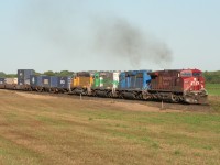CP 245 accelerates westward out of Wolverton siding with three leaser locomotives of different paint schemes trailing. Note, at this time, Wolverton was not CTC yet.