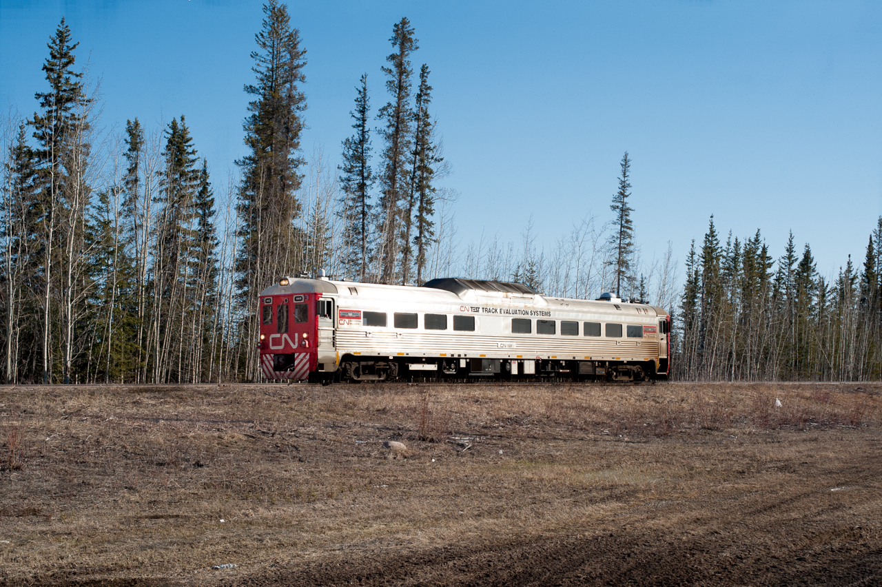 Testing tracks at Canadian Nationals North End, venerable RDC-1 15016 dips in the deep wilderness of Northwest Territories as it leaves Hay River town on its way south.