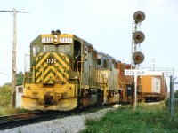 During the US Rail strike of fall 1978, some NW/DH trains were detoured over the CASO in Southern Ontario. Here we see D&H 7415, 7616 and 7315 just coming off the yard trackage onto the mainline at CN Duff westbound. Interesting power on the D&H back then. After the restructuring of the Northeastern US Railways upon the creation of Conrail; the D&H ended up with Reading (first unit), and Lehigh Valley (third unit). The middle unit is the famed "lightning stripe" scheme that made this line so popular with the fans.