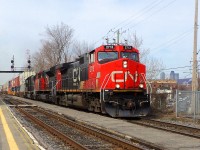 IC 2713 a C44-9W leading loco follow of CN-8906 a SD-70-M2 plus Illinois Central 1032 a SD-70 all 3 pulling a long convoy of containers that you could see up in Victoria bridge over 11,000 feets coming from Toronto going to Halifax plus a bacgrounnd of Downtown Montréal buildings