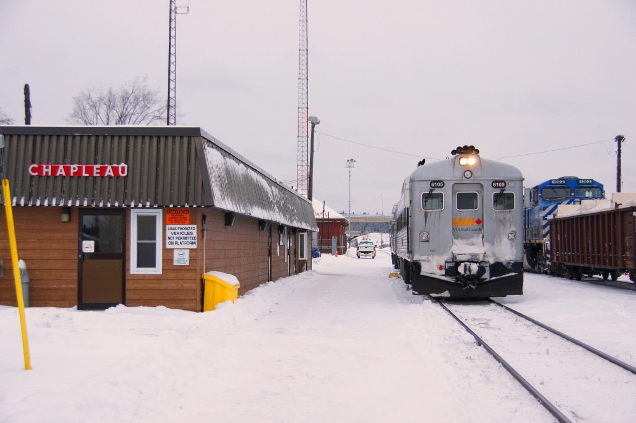 36 years after Arnold Mooney's photo I found myself on my way back from White River. While the station, poles and antenna are in the same places, and we were riding on similar equipment, it seems only the train number, the Monk Street bridge and the station's roof have remained identical.