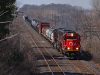 CN 509 heads eastbound towards London on its return trip from Sarnia as it is just about to pass under the Denfield Road bridge at Hyde Park.