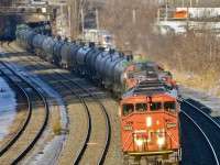 An unbelievably late CN 305 heads west after getting a new crew at Turcot West. Power is CN 5543, CN 2176 & CN 2578. For more train photos, click <a href=http://www.flickr.com/photos/mtlwestrailfan/>here.</a>