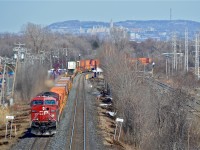 CP 143 curves around a bend on CP's Vaudreuil Sub as the head end passes the advance station sign for Valois Station. Power is a pair of GE's (CP 9643 & CP 8709) For more train photos, click <a href=http://www.flickr.com/photos/mtlwestrailfan/>here.</a>