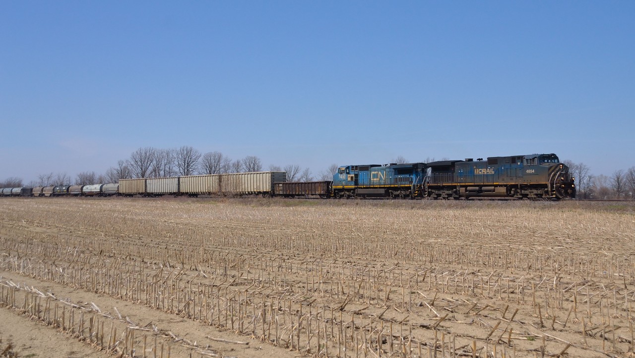 CN 330 with an all blue consist in BCOL 4654 and IC 2460 heads eastbound after just departing Sarnia.