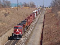 CN 501 makes its decent down the grade towards the tunnel to Port Huron MI led by CP 8646 & BNSF 4723