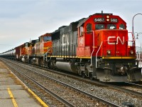 CN 710 rockets through Dorval with an ex-Oakway SD60 and 2 BNSF units, including the Microsoft Train Simulator unit (CN 5482, BNSF 4723 and BNSF 9905). For more train photos, click <a href=http://www.flickr.com/photos/mtlwestrailfan/>here.</a>