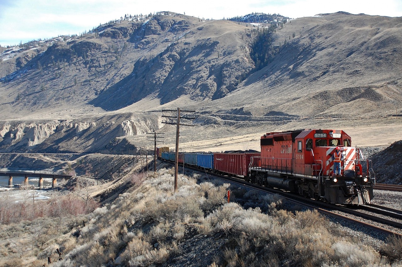 After switching at the Ashcroft Treating Plant, CP 5794 heads west towards Ashcroft with this local freight. I had never seen a crew member riding at the front of the loco like this before.