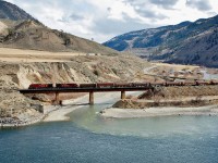 CP nos.9779 & 8613 are in charge of an eastbound mixed freight as they cross the Nicola River just before it merges with the Thompson.