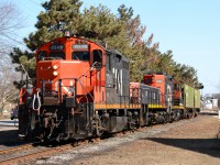 CN7245 with slug 227 and CN7264 working the Cargill elevator shunt at Maxwell Street in Sarnia.