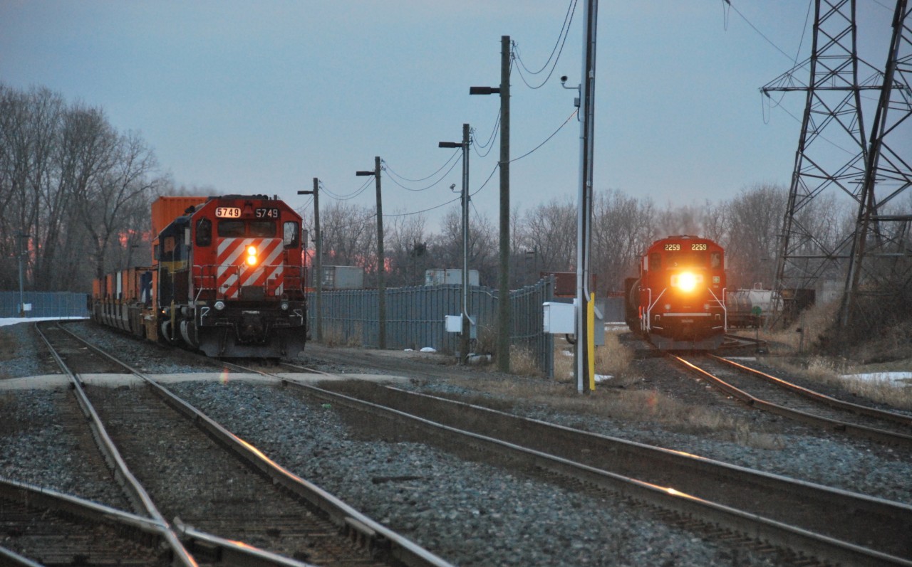 CP 5749 & DME 6068 sit at Dougall waiting for a crew while CP 2259 and another GP20C-ECO switches ETR's yard.