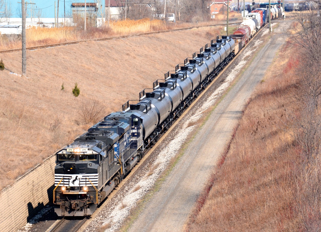 NS2711 with CN8100 head west bound through the St. Clair River to Port Huron, Michigan.