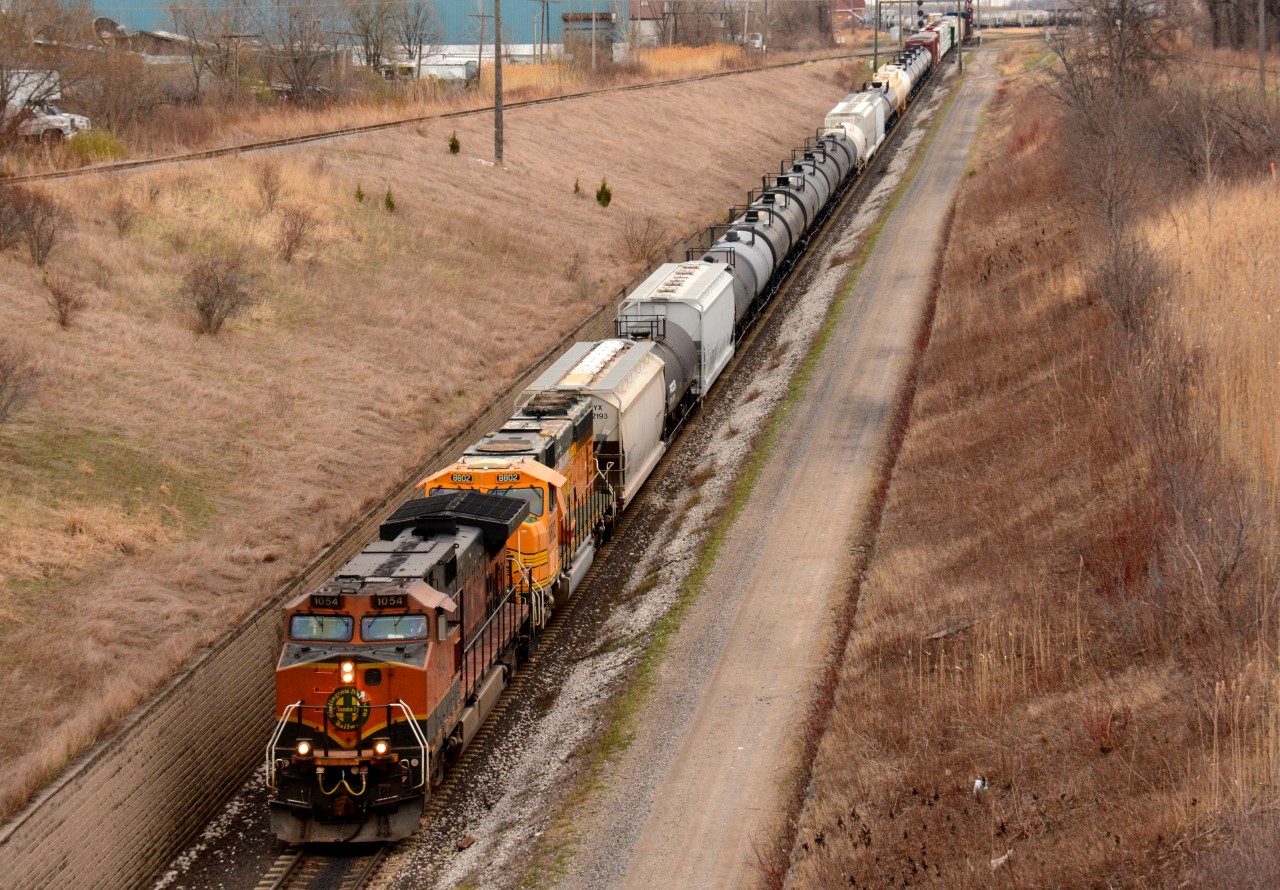 BNSF1054 with BNSF8802 head towards Port Huron, Michigan through the St. Clair River tunnel.