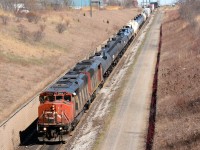 CN5503 with CN5519 lead 501 west bound for Port Huron, Michigan through the St. Clair River tunnel.