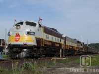 CP's Royal Canadian Pacific passenger train came to visit the North Shore of Superior to celebrate the 125th anniversary of the Last Spike. FP9u 1401 - FP9B 1900 - GP38-2 3084 are the ones sporting the old maroon and grey paint scheme, leading the retro passenger equipment. A couple of the cars (head two?) were "Museum" cars showcasing various highlights and moments in CP's history, including the famous last spike.