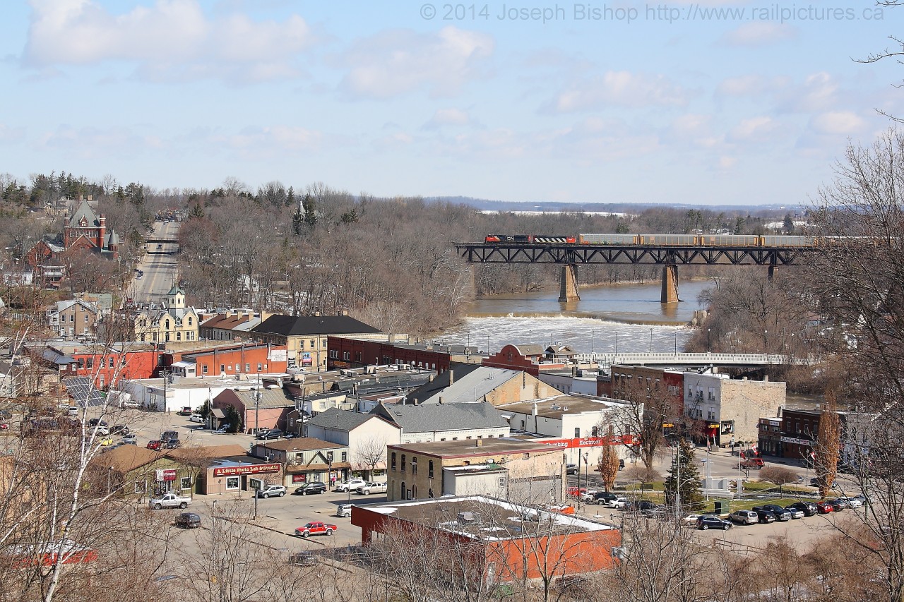 CN 393 breaks the silence in Paris as they cross high above the downtown core on the bridge over the Grand River.  The power for 393 was CN 8857 and CN 5538.