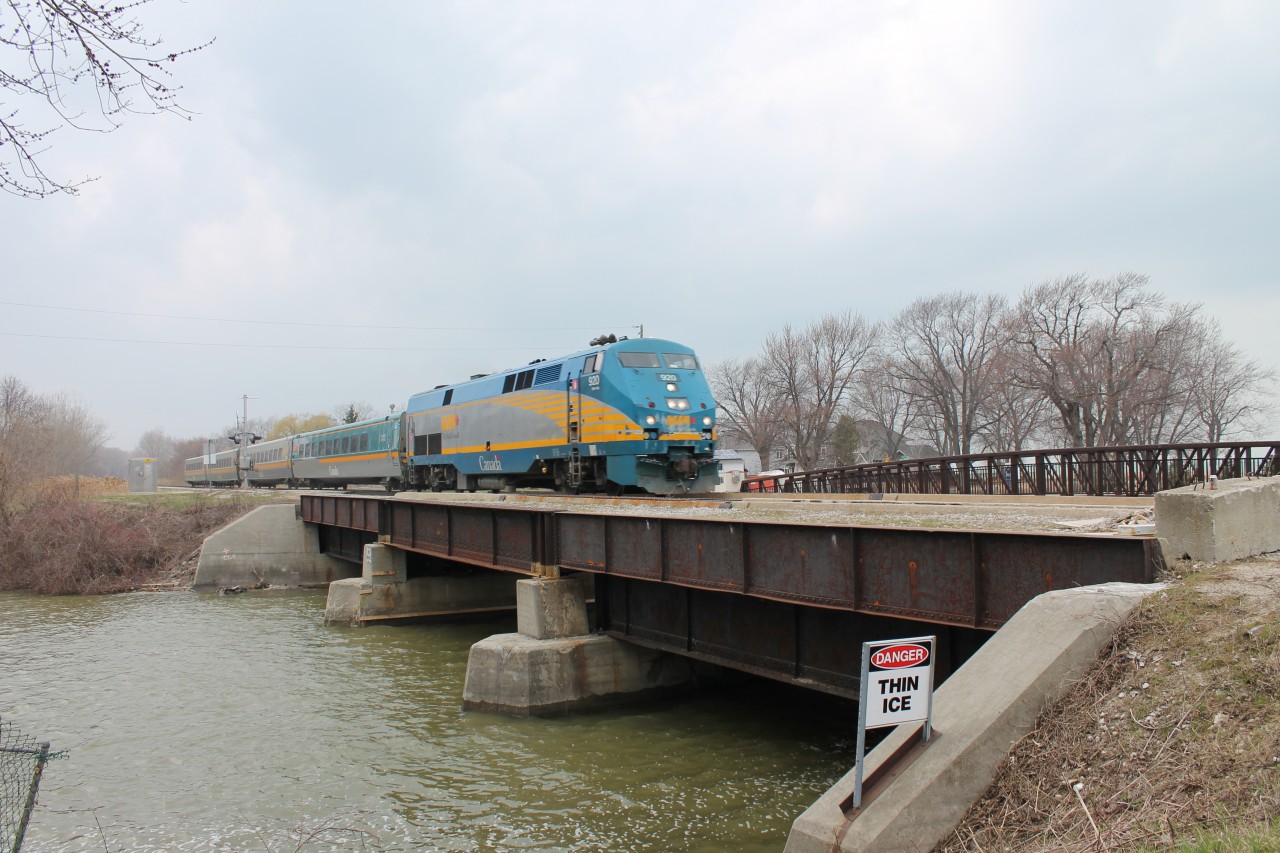 My dad and I saw VIA 76 sitting at the station in Windsor so we decided to catch it going over the Belle River in Belle River, Ontario. They were flying through town. They were doing at least 90m/h. The train also had one of those rebuilt VIA1 LRC cars.