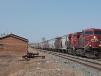 Southbound grain train through Aldersyde Alberta. 