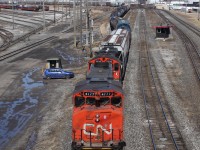 CN 4777 and a GP9u shunt a few cars back and forth which will later go on mainline freights. Thanks to the crew for the awesome horn salute. For a fun fact, Canadian National's Macmillan yard is the largest of its kind in Canada.