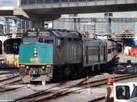 VIA rebuilt F40PH-3 quickly picks up speed from Union station and passes the railfan on the end of the Skywalk, behind what is now the newly built Ripley's Aquarium of Canada. I visited in the day and it was a awesome, recommended place if you're ever in the area. This location is great if you want to see lots of trains, however, the shots are not the greatest and the only action is GO Trains and VIA Rail Trains.
