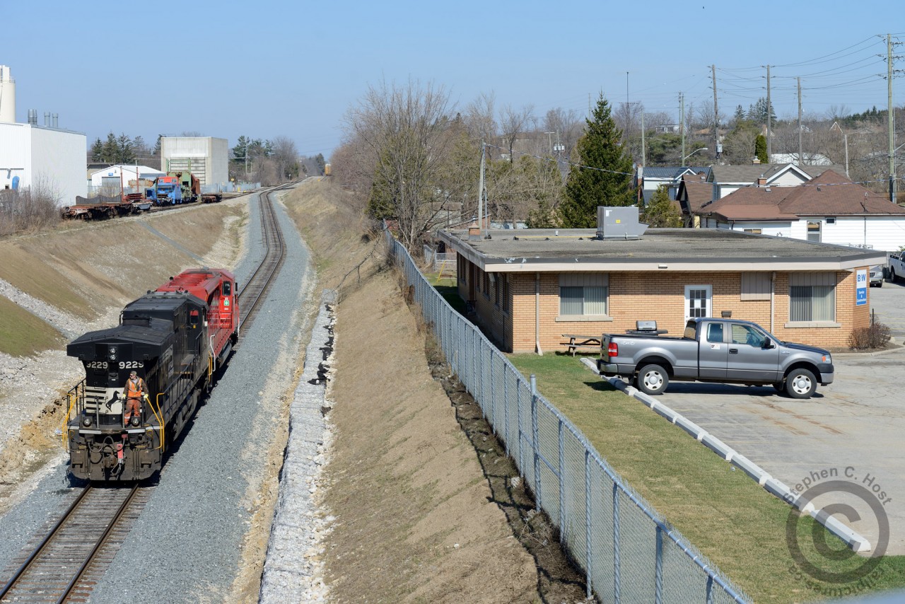 After setting off 5000' of autoracks on the GEXR Fergus spur (Leased to CP - seen at top - to the right of the CPR Waterloo subdivision) 244's power is heading back to the Galt Subdivision to run light power to Toronto. In the background is the Babcock and Wilcox plant - jointly accessible by CP and GEXR - marks the southernmost point GEXR can access on the Fergus spur from Guelph.