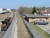 After setting off 5000' of autoracks on the GEXR Fergus spur (Leased to CP - seen at top - to the right of the CPR Waterloo subdivision) 244's power is heading back to the Galt Subdivision to run light power to Toronto. In the background is the Babcock and Wilcox plant - jointly accessible by CP and GEXR - marks the southernmost point GEXR can access on the Fergus spur from Guelph.
