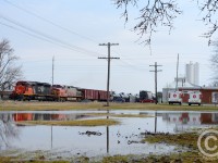 Empty oil train, #711 flies through Princeton Ontario - a bucolic little town between Woodstock and Paris/Brantford. Thanks to John Lowes for the inspiration - the temporary pond made for a nice backdrop for the three of us who were present.

