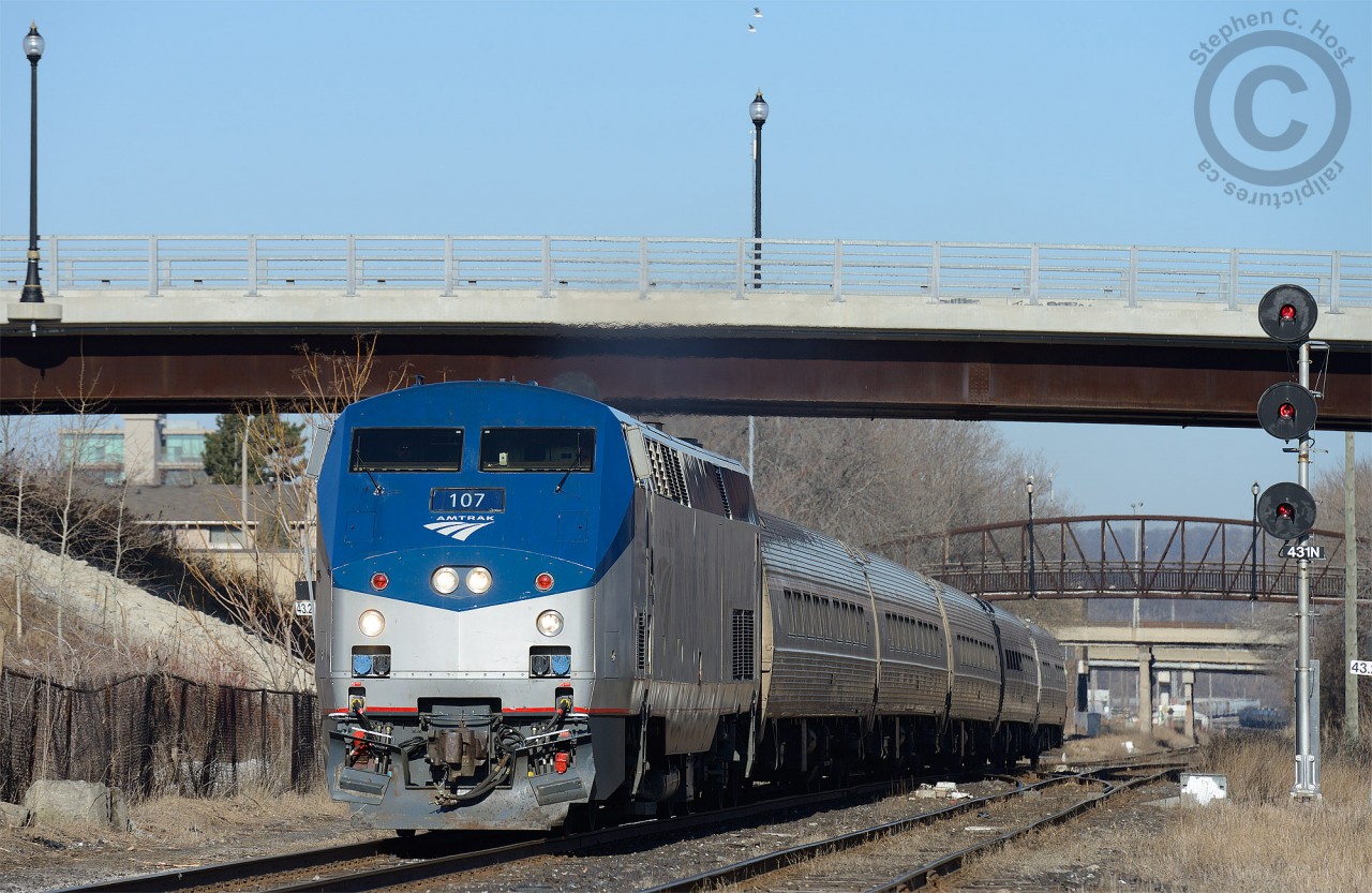 VIA 97 - the Maple Leaf, en-route to New York City gains speed after clearing the crossovers for Hamilton yard.