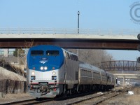 VIA 97 - the Maple Leaf, en-route to New York City gains speed after clearing the crossovers for Hamilton yard. 