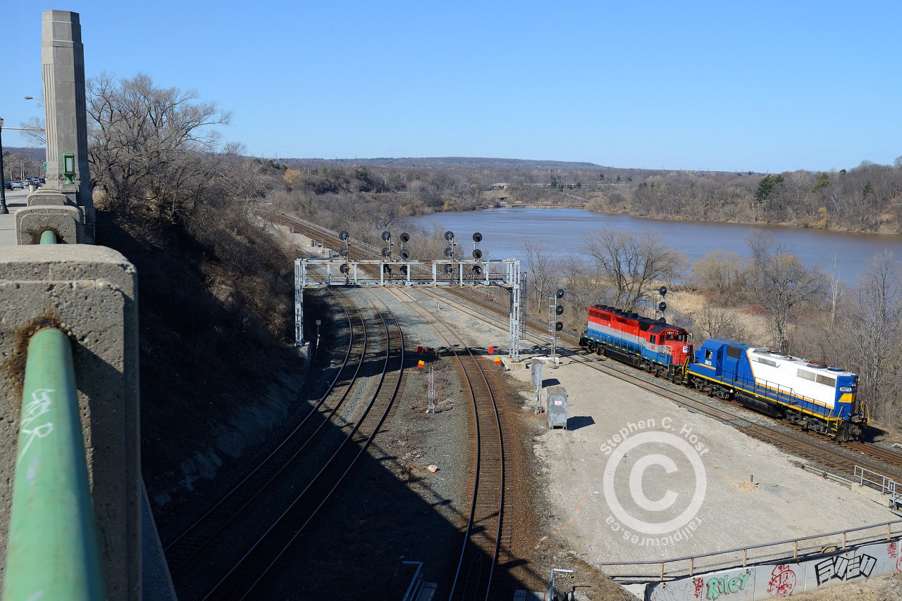 A pair of Southern Ontario Railway engines, in an odd nose-to-nose configuration are seen here making a move at Bayview, in order to get from the north to the south track after 4057 was pulled from the former SOR/CN Shops earlier. It won't be long before the trees are lush with green foliage as spring has finally arrived.