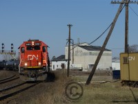 X396 rounds the curve at Paris Junction. Once the junction point of the former Mainline (before the Brantford Division/cutoff), the Drumbo sub, and the Dundas subdivision - the old main was ripped out in the 30's, and the drumbo around '82. Passenger trains would have taken this signal up the Drumbo Sub to Stratford and Goderich until about 1970.
