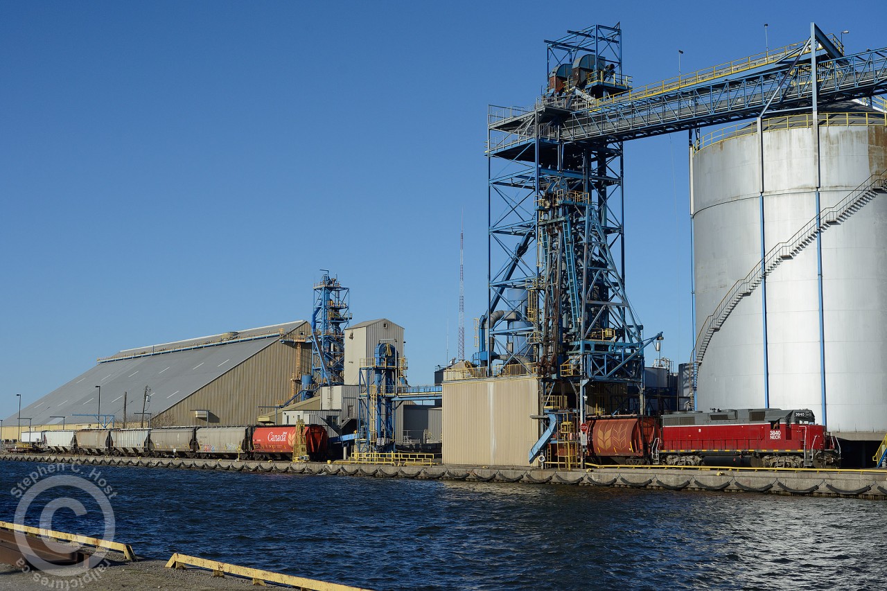 A single Canada grain hopper is seen being delivered to the Bunge Bayside lead along the Port Authority of Hamilton's waterfront.