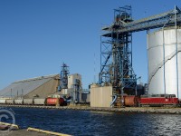 A single Canada grain hopper is seen being delivered to the Bunge Bayside lead along the Port Authority of Hamilton's waterfront.