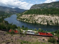 The westbound Trail freight approaches the Teck Cominco lead zinc Smelter on the Columbia River in the West Kootenay region of BC
