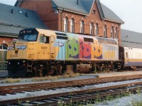 Of all the ad wraps on VIA's locomotives, the Kool Aid graced the most; having covered 10 units. But the promotion was so short-lived in the summer of 2000 that most were gone before fans realized they were in place. Early summer they adorned units 6404,05,06,11,24,32,33,39,53 and 54. By fall they were all gone. This image of KoolAid 6411 out front of the Niagara Falls VIA station was one of only a few I saw. The ad promotion was interesting, colourful, and gave fans something to watch for when the scanners chirped out that another passenger train was on the way. I always wanted to see a wrap featuring "Timmies", with a big donut on the nose. Although we did see Home Hardware, Telus, CBC, Spiderman, Pepsi and Loto Quebec among others over the years, alas.....no Timmies.