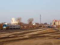 A completely empty upper yard allows for this view of VIA 83 passing CN 435 as he pulls into the east end of Racecourse yard. These days, both 83 and 435 terminate at London.