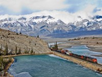 Extra manifest from Edmonton-Vancouver speeds west along the Edson Sub near Jasper behind CN SD60F 5513 and CN C44-9WL 2512.