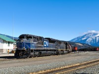 After changing crews, Edmonton-Prince Rupert grain train G847 departs Track 1 behind one of CN's 4 recently acquired ex EMD SD70ACe demo units. A pair of loaded coal trains wait their turn to depart in the background.