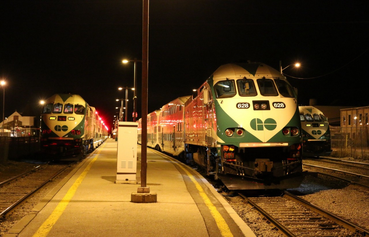 The early morning rush hour is about to begin as the first GO train to depart is loading its last passengers before entering the CN's Halton sub. on its way to Toronto's Union Station.
