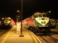 The early morning rush hour is about to begin as the first GO train to depart is loading its last passengers before entering the CN's Halton sub. on its way to Toronto's Union Station. 