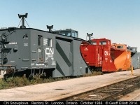 CN Snow plows sit at Rectory Street in London in October of 1988 adding a little color to the otherwise drab background.