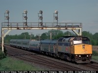 VIA #6427 leads train #75, bound for Windsor, Ontario, with a mixed consist under the quadruple signal at Paris West.