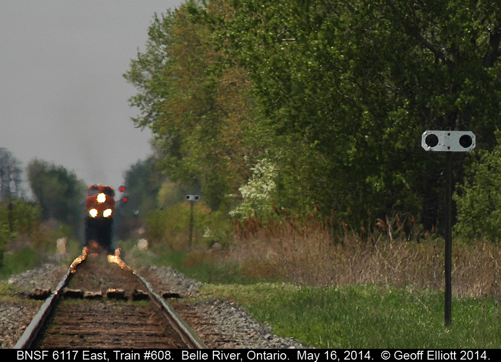 "Yonder comes the Train" was a railway book that my Grandmother got me for Christmas back in the mid-1970's.  In keeping with the title here is a shot of CP Train #608, with BNSF 6117 on the point, departing Belle River on May 16, 2014.  I just like the compression that I got with this shot.