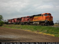 BNSF ES44AC #6117 is on the point of eastbound CP train #608 as it passes the westbound Belle River mile board on it's trip east across southern Ontario on May 16, 2014.