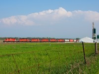 Much to my amazement when CP 421 went by my house with six, count em six SD40-2 variants that I had to give chase somewhere north to get a nice broad side shot of the power. So here it is after waiting on the CP 5874 South and working the yard at Spence, CP 5988 North is seen in all her glory as they race north through the countryside at Baxter. 