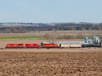 A red barn, a GP38-2 and a SD40-2 are today's flavours on CP 421.  Seen here racing through the country side north of Alliston, Ontario. 