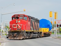 Although the light is harsh as can be due to the high sun, a rare daylight dimensional move from Babcox and Wilcox heads down the Toronto Harbour Spur. 