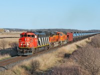 14,000 tons of crude head up grade at Mile 38 of the Halton Subdivision behind a stellar lashup.