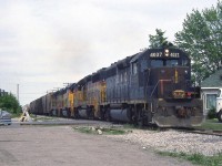 An eastbound Chesapeake and Ohio freight rolls through Leamington ON on Sub 1, with battered B&O GP40 4037 leading three units bearing newer Chessie System paint a year before CSX Transportation became the official company. A few years later, 4037 would be renumbered as CSXT 6612, but still retain its old B&O colours.
<br><br>
<i>Note, geotagged location not exact.</i>