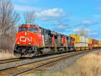 CN train 149 with engine 2268 approaches the road to Darlington Provincial Park east of Oshawa.